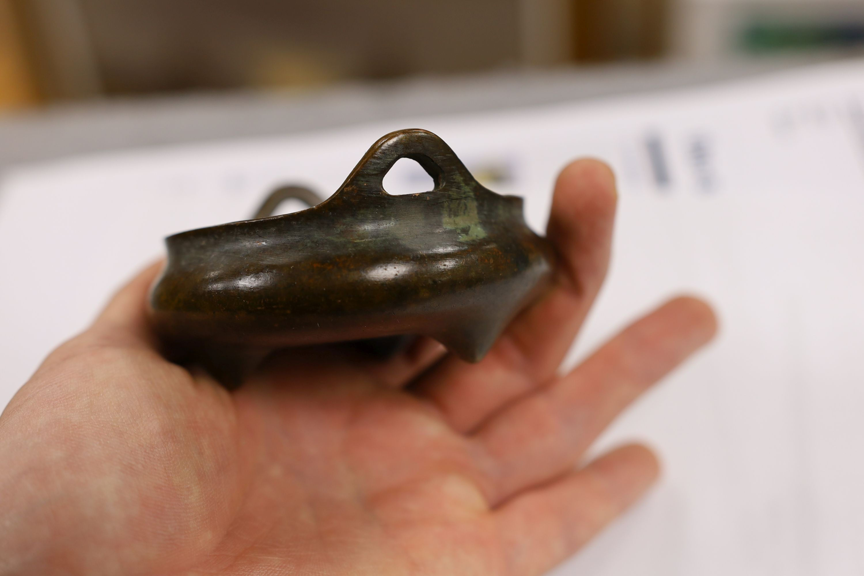 Two Chinese bronze censers, largest 11cms diameter